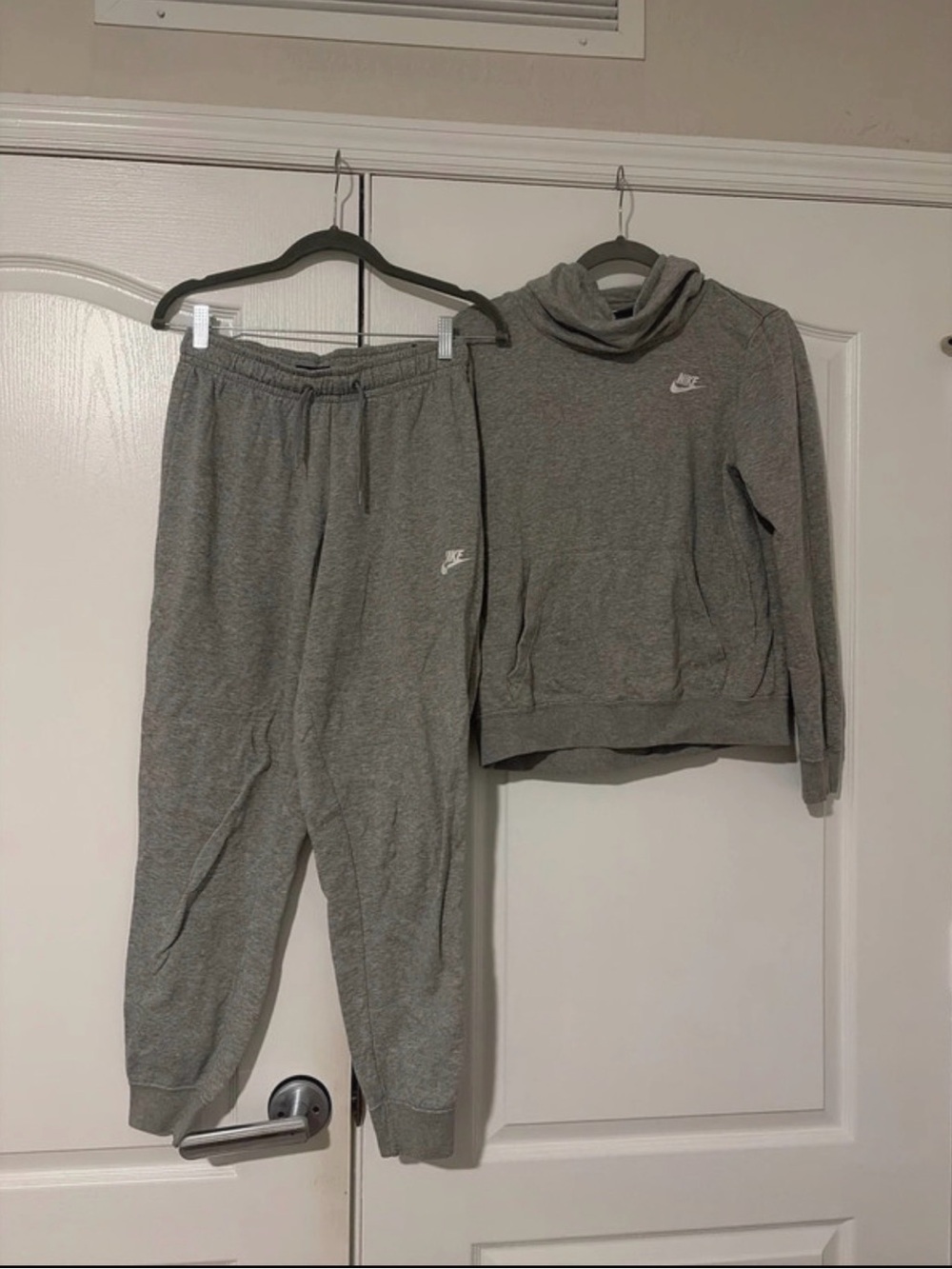 Nike Light Gray Hoodie with White Swoosh Logo